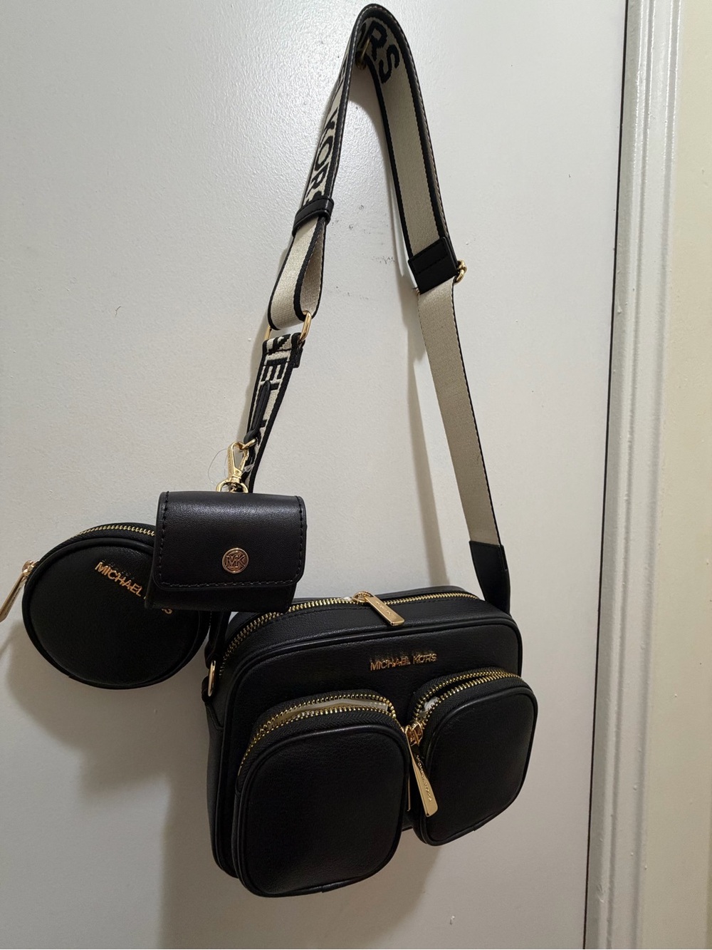 Michael Kors Black Crossbody Bag with Gold Hardware and Detachable Pouches